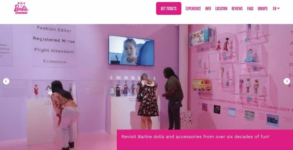 An image of the World of Barbie exhibit, featuring different Barbie dolls throughout the decades.