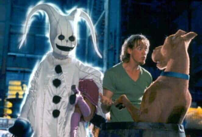 An image of the 2002 Scooby-Doo live adaptation, with characters Shaggy, Scooby, Daphne, and a villain.