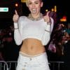 Singer Miley Cyrus sticks her tongue out at camera in 2013, the year of her controversial VMA performance