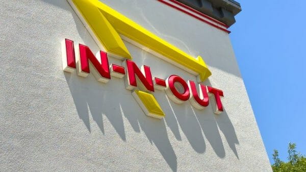 In-N-Out logo with red lettering and yellow arrow