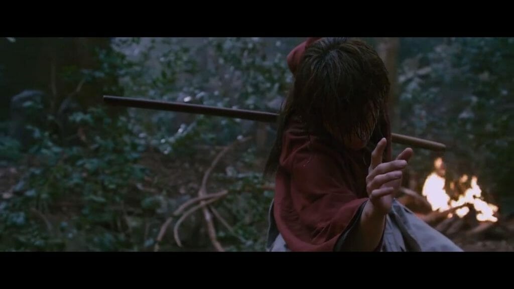 Kenshin frequently poses like this - the movies exaggerated it to provide the same feeling of agility in real life.