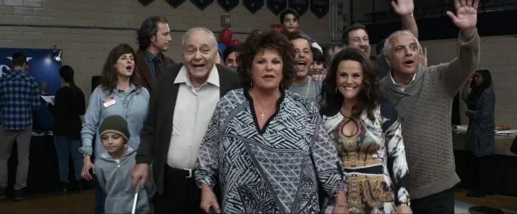 Toula's family coming to a game at Paris' high school.