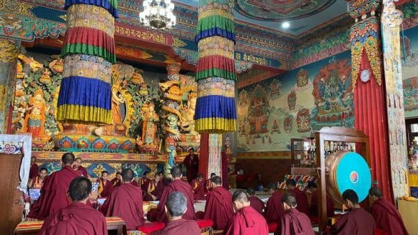 Buddhist monks sat down in a Nepalese monastery