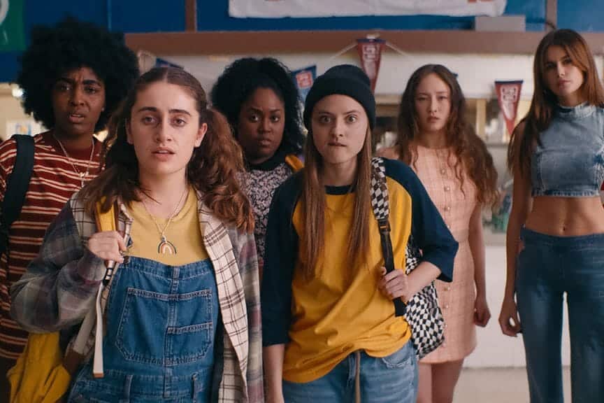 Still from 'Bottoms' which depicts the main ensemble staring ahead with confused expressions.