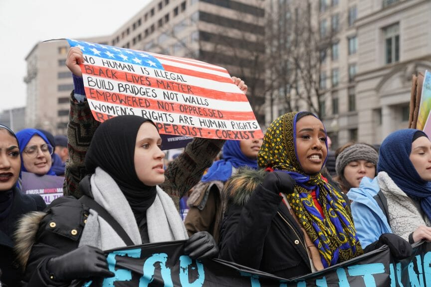 Women protestors supporting Iran and other MENA countries after the 2016 Muslim ban. Property law ban