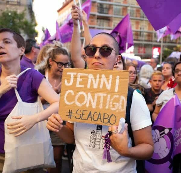 People protesting with a Jenni Contigo sign in Madrid, Spain.