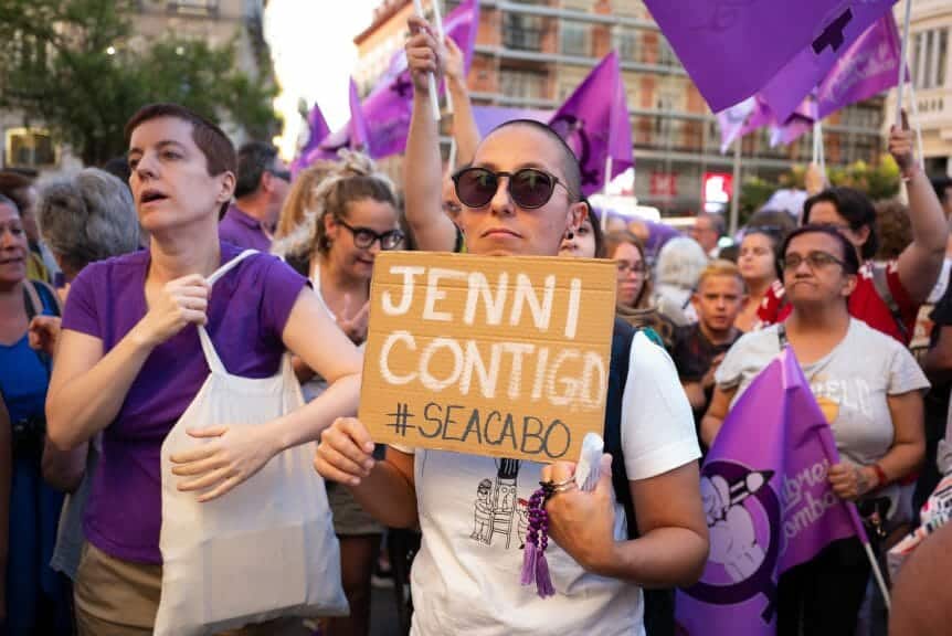 People protesting with a Jenni Contigo sign in Madrid, Spain.