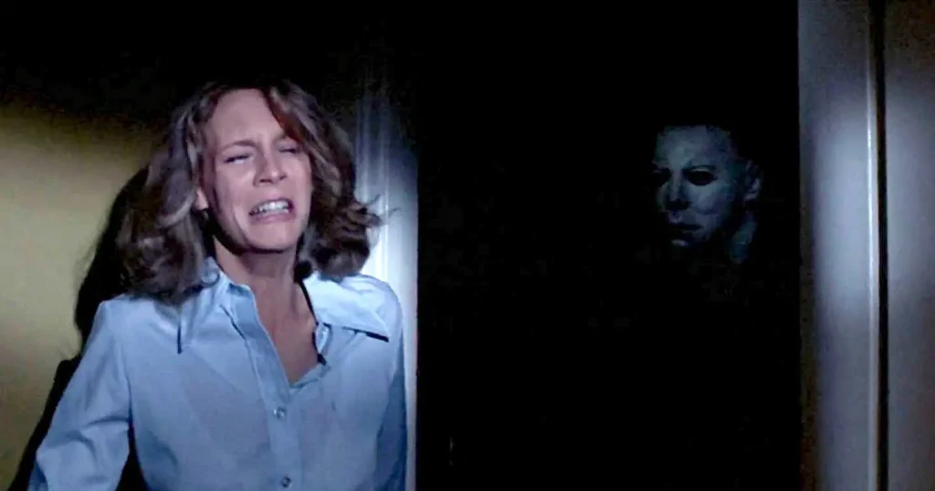Laurie hides from Michael Myers in the final sequence of 'Halloween.'