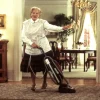 Mrs. Doubtfire hoovering the living room.