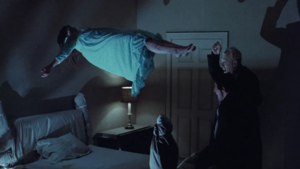 Father Merrin and Father Karras perform an exorcism on Regan as she is levitating in the air. 