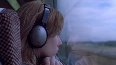 Scarlett Johansson staring out the train window in 'Lost in Translation.'