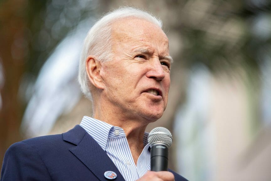 Biden Speaking into microphone. Gun Safety