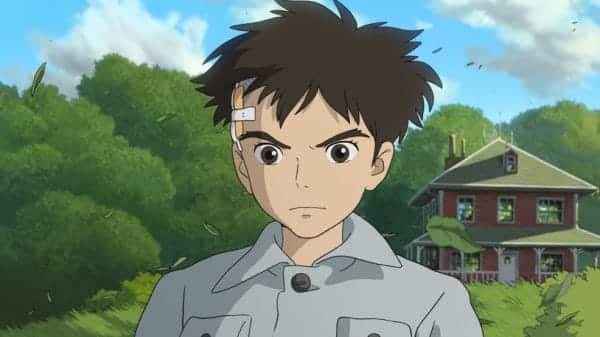 Image of a young boy from Studio Ghibli's The Boy and the Heron. Mahito is alone in the frame and with a band on the side of his head.