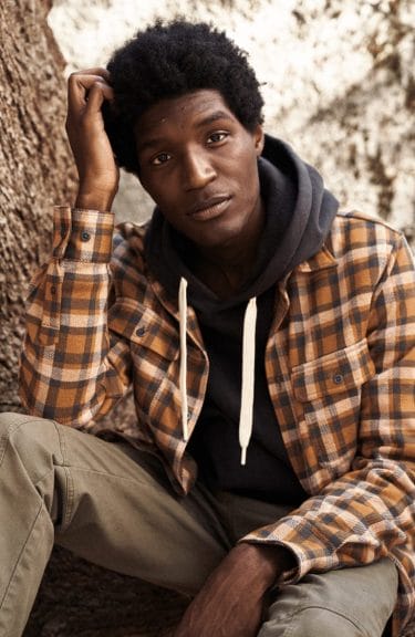 Man wearing sustsainbale clothes from brand UpWest
