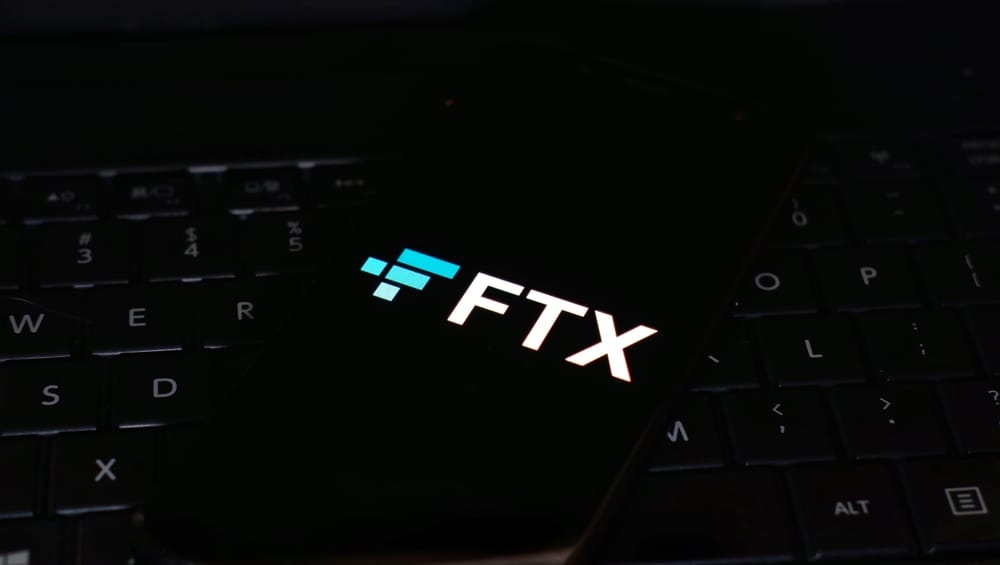 Logo of FTX, the cryptocurrency co-founded by Sam Bankman-Fried.