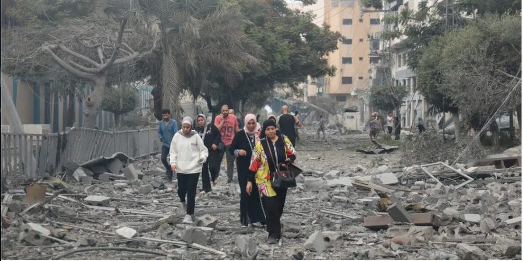 Palestinians amongst the rubble in Gaza