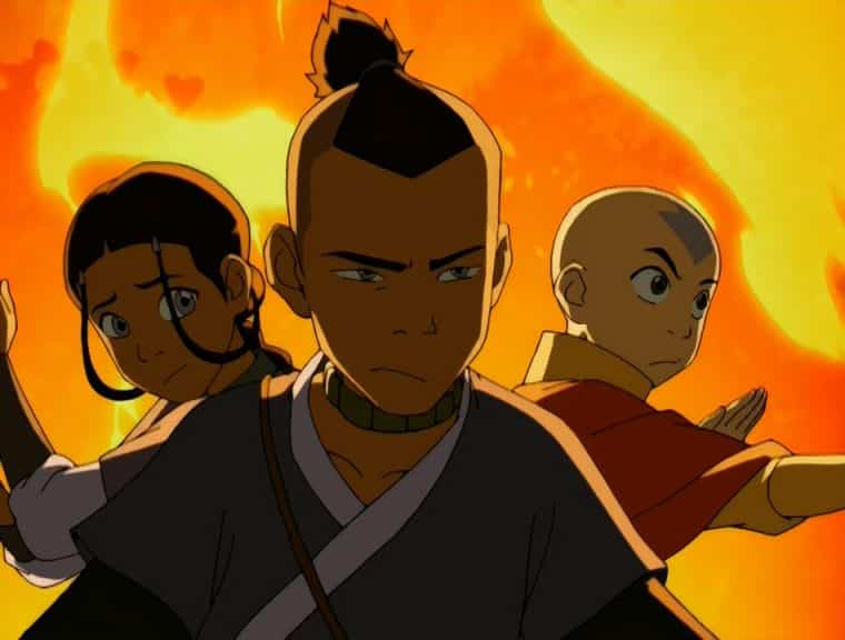 Katara, Aang, and Sokka prepare to fight in the Netflix series, Avatar: The Last Airbender