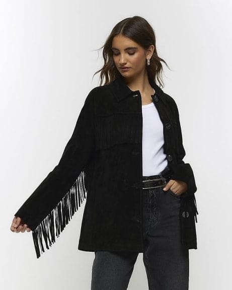 Girl Wearing Black Fringe Jacket