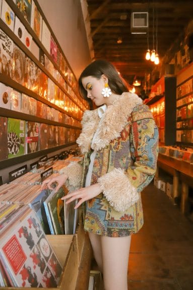 Pinterest Trends - Girl Wearing Fur Coat and Daisy Earrings