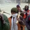 Rat-hole miners entering the site. Credit: YouTube/ Reuters.