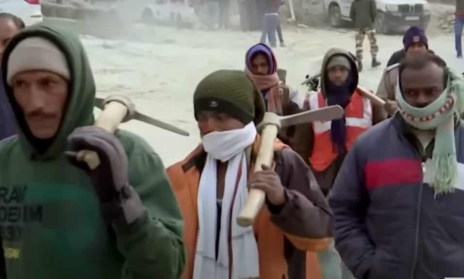 Rat-hole miners entering the site. Credit: YouTube/ Reuters.