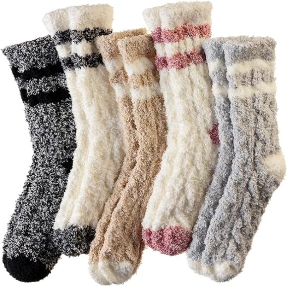 Five pairs of fluffy socks in different light-toned colours.