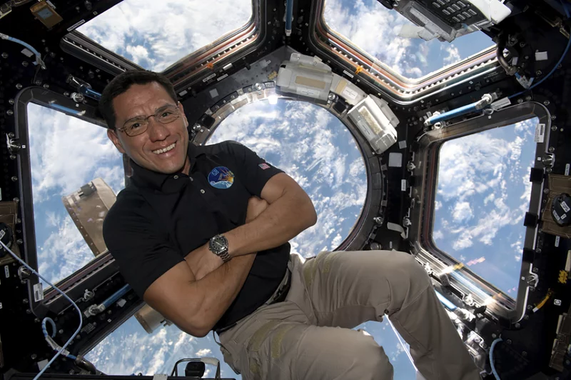 Frank Rubio floats inside the "Window to the World" aboard the International Space Station. 