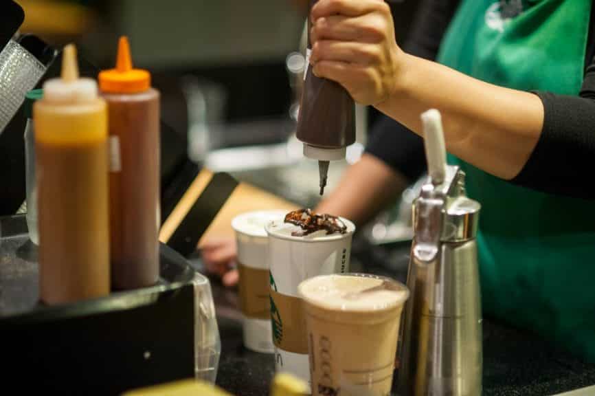 Starbucks Workers Making a Hot Chocolate