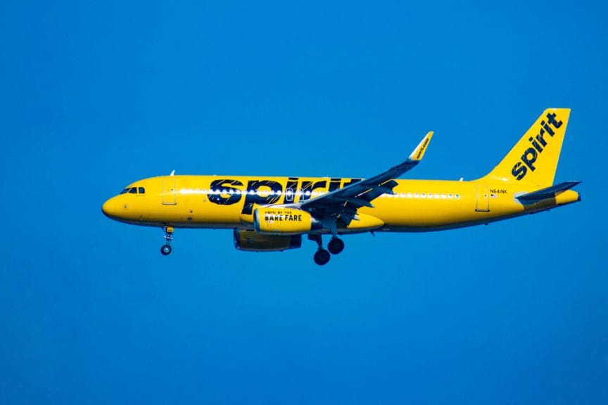 Spirit Airlines landing in Orlando International Airport. Image: VIAVAL TOURS/Shutterstock