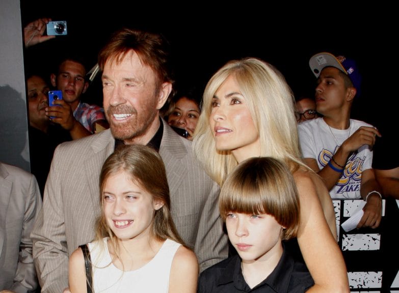 Chuck Norris with his wife Gena O'Kelley and their two kids in a red carpet photo