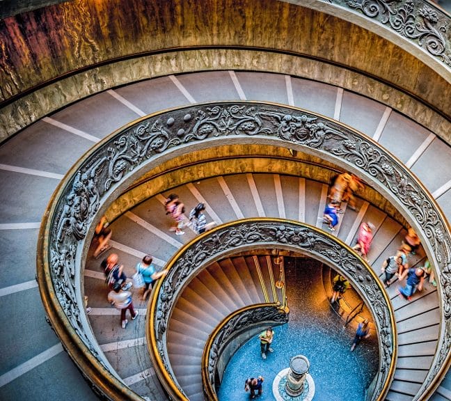 A circular staircase at the Vatican - representing the Catholic church which clashed with Rome's mayor about the Trevi fountain's coins