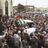 Mourners pay tribute to hate crime victim Wadea Al-Fayoume, a six-year-old boy who was murdered by his landlord.