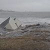 Image showing Maine fishing shacks being swept out to sea