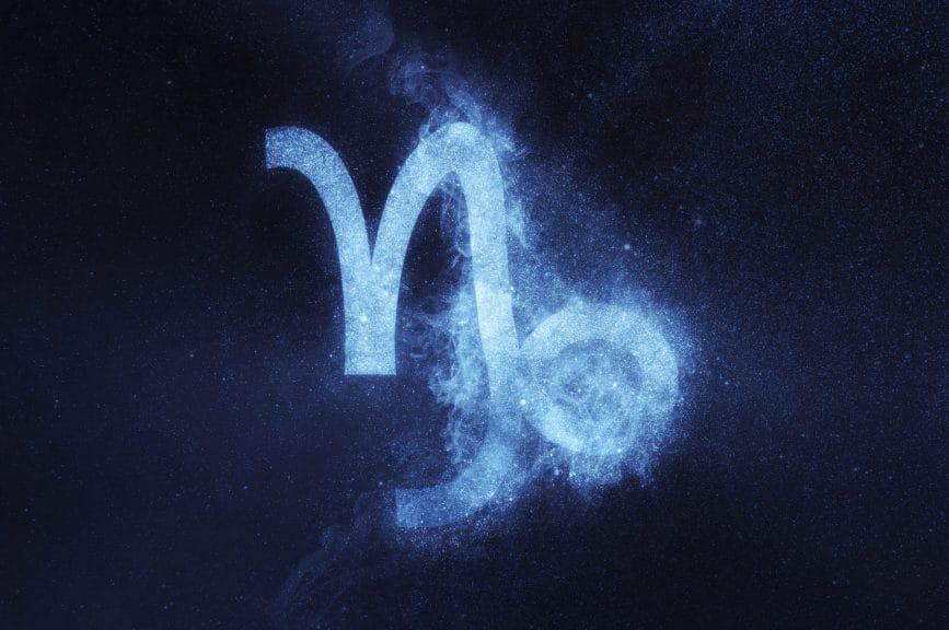 Capricorn Zodiac Sign on abstract night sky background