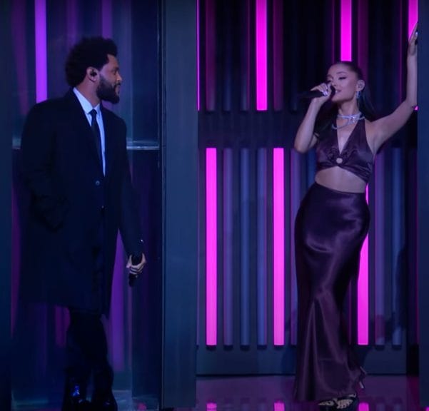 The Weeknd and Ariana Grande performing his remix of "Save Your Tears", on stage at the iHeart Radio Music Awards 2021.