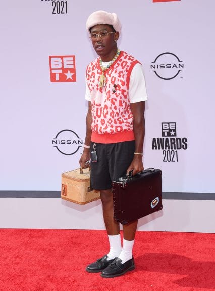 tyler the creator wearing a sweater vest indicative of the eclectic grandpa trend