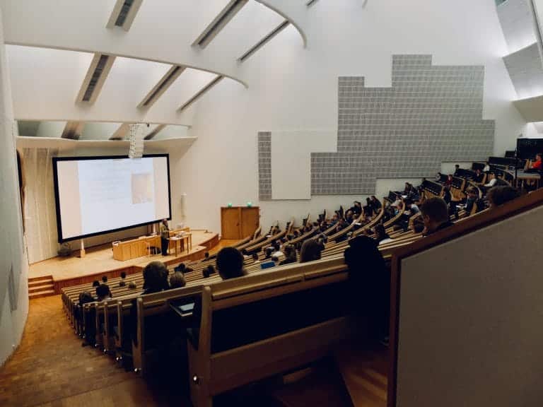 Person presenting in college lecture room