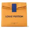 Product image of front of Louis Vuitton sandwich bag, orange with blue fastening and writing