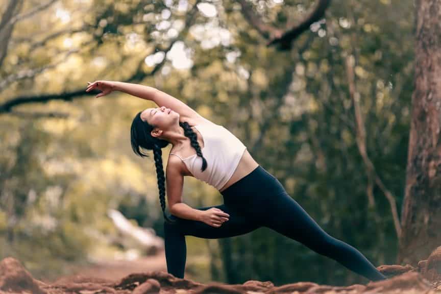 Girl stretching on hike