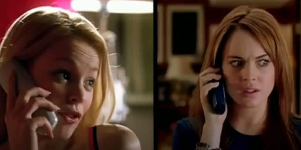 A blonde girl and a redhead talk on the phone