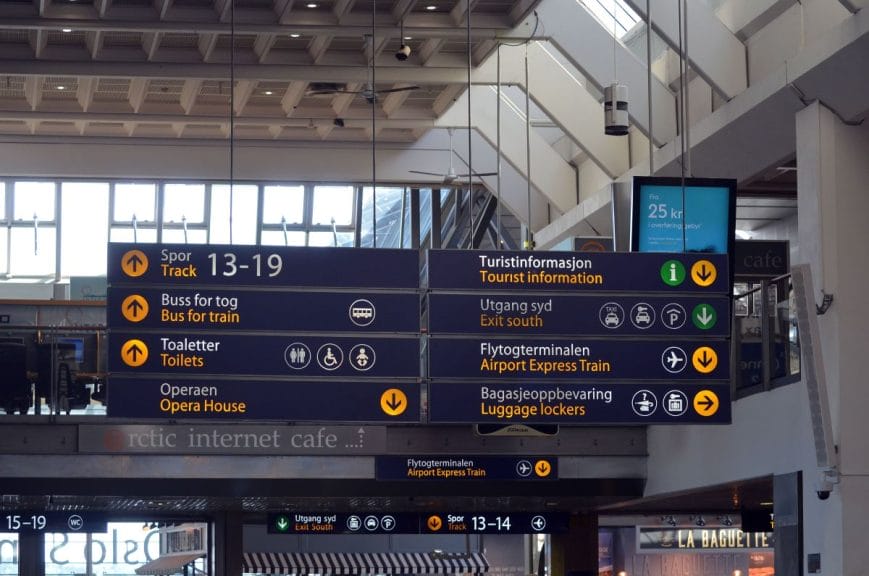 Signs inside Oslo Central Station.