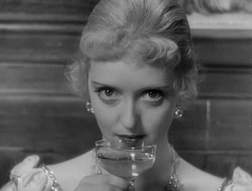 Bette Davis looking maniacally into the camera.