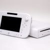 Wii U console in white, with the main console sitting next to the gamepad.