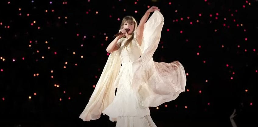 Taylor Swift performing during the "folklore" set of her Eras Tour.