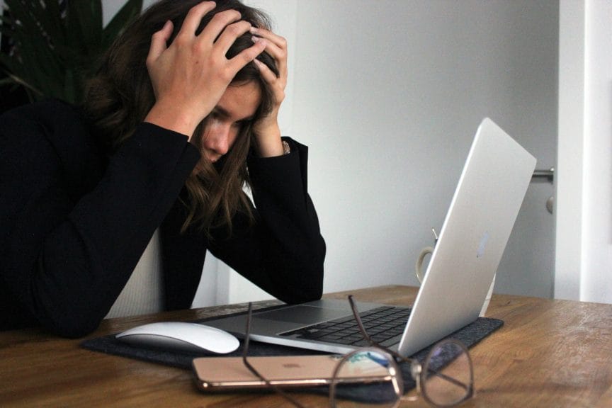 Woman stressed at computer