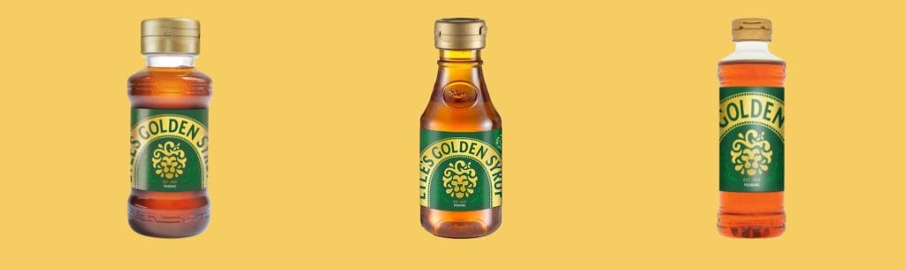 A plastic bottle with a gold lid and green and gold label containing golden syrup.