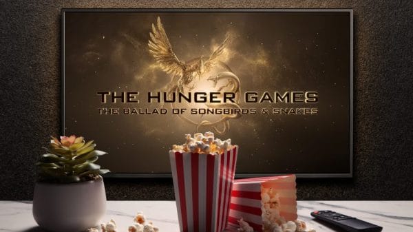 The Hunger Games: Ballad of Songbirds and Snakes plays on screen beyond popcorn and remote.