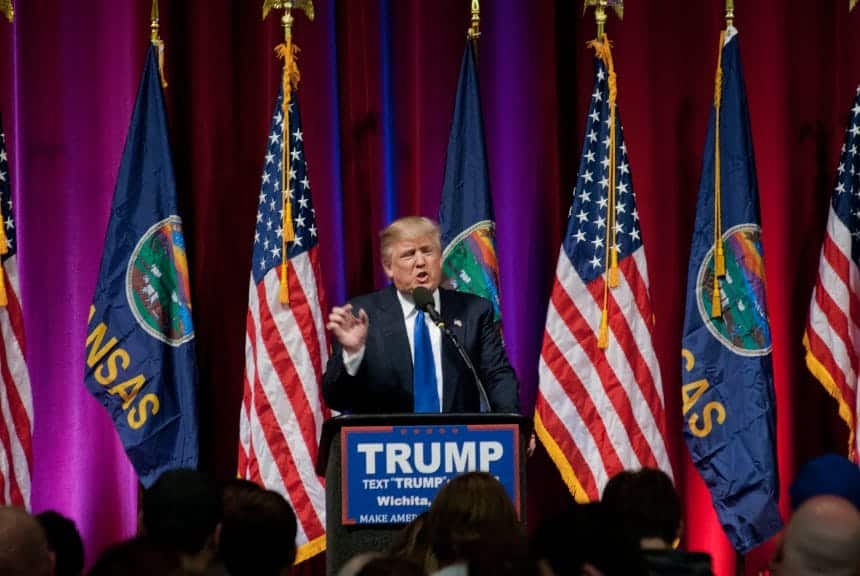 Former president Donald Trump addressing a crowd.