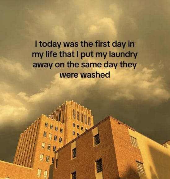 Buildings in a dark, stormy sky with the statement, “I today was the first day in my life that I put my laundry away on the same day they were washed.”
