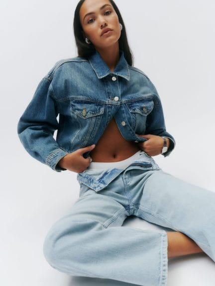 Sustainability in Brands - A Woman Wearing Jean Jacket and Pants from Reformation
